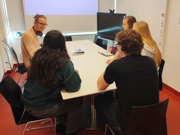 People attending smaller discussion group